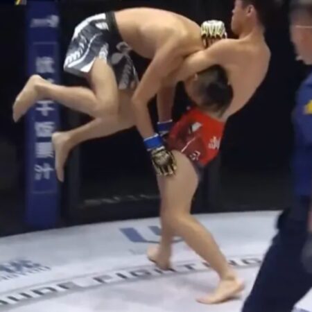 Missed Fists: Grapplers attempt to dunk each other in Ultimate Tire Wrestling